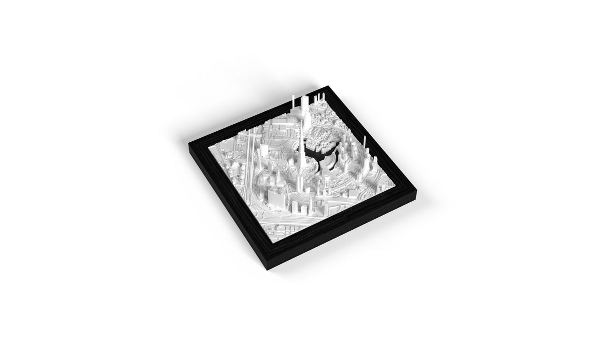A 3D city model of downtown Dubai with the Burj Khalifa in a dark wooden CUBE frame